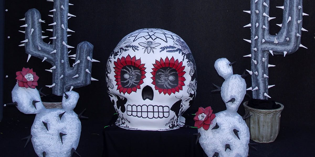Decorative skull and cactus sculptures for Day of the Dead celebration at Ventura Botanical Gardens.